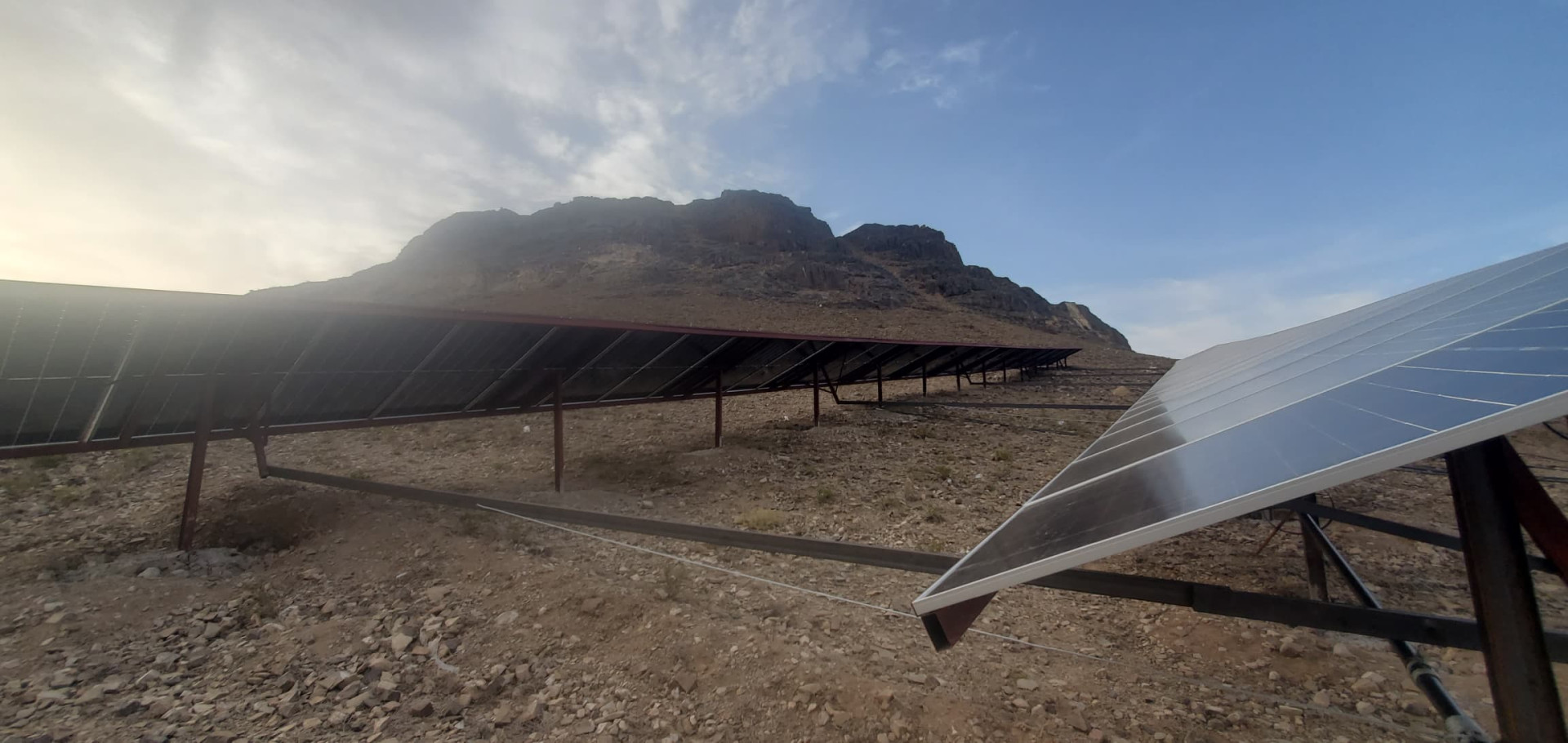 100KW Solar System consisting of 157 panels with a capacity of 635W per panel, a 75KW motor, and a 63W pump. Well depth: 550M. Al-Jahraan District - Al-Koula Village - Dhamar - Yemen.