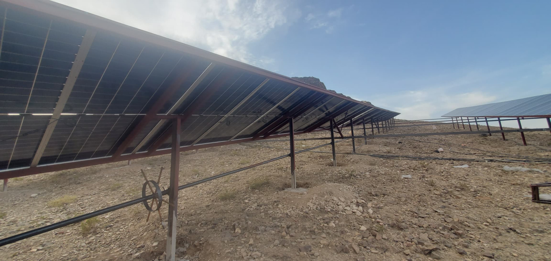 100KW Solar System consisting of 157 panels with a capacity of 635W per panel, a 75KW motor, and a 63W pump. Well depth: 550M. Al-Jahraan District - Al-Koula Village - Dhamar - Yemen.